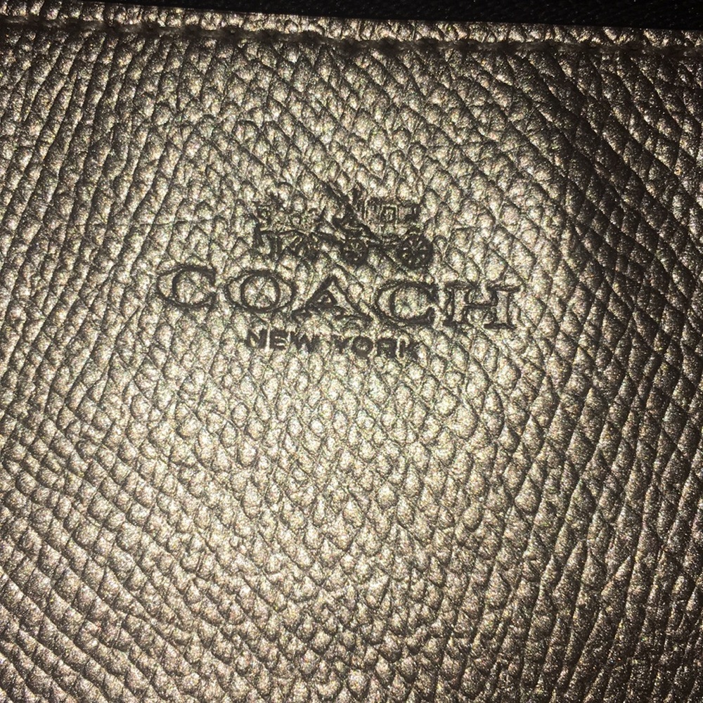 🦋coach gold wristlet🦋